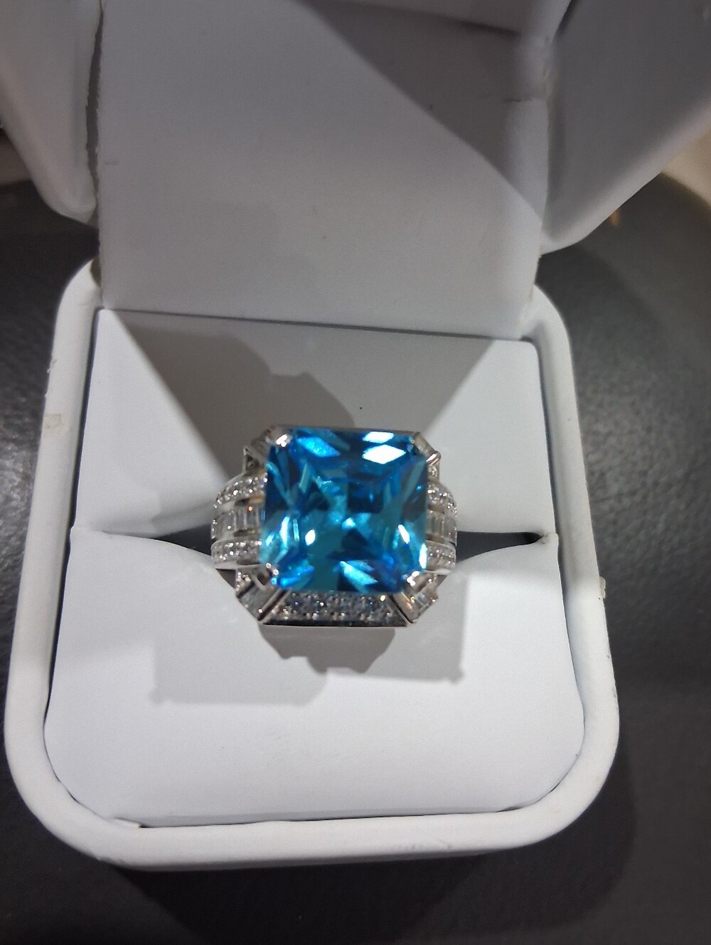 Sterling Silver 5+ Carat Emerald Cut Blue Topaz & Channel Set CZ Cocktail Ring